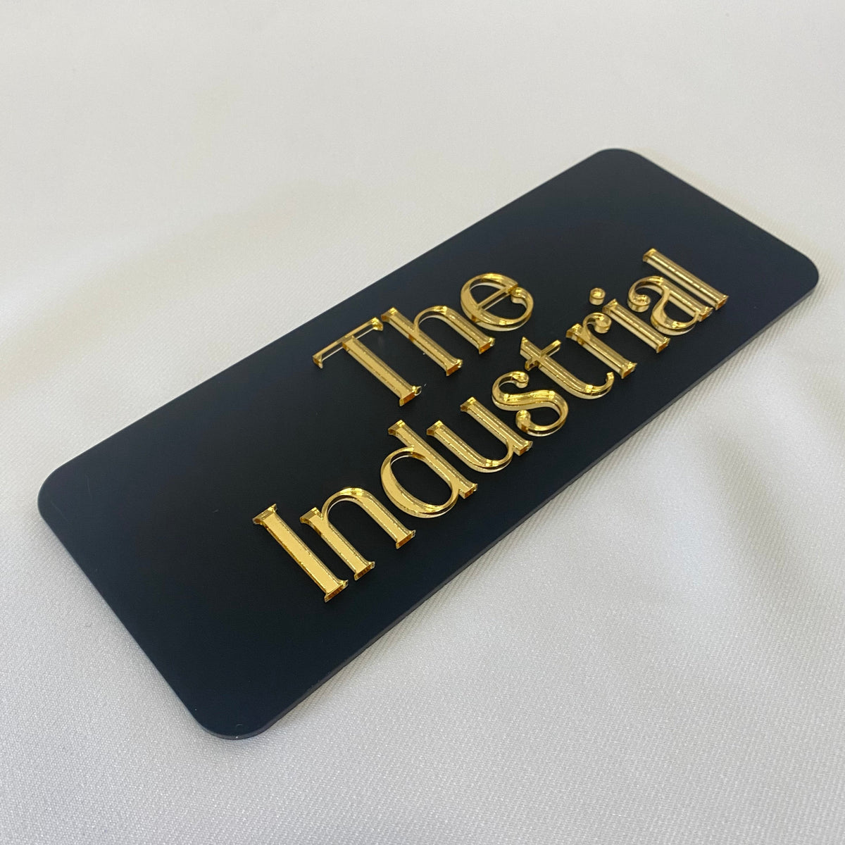 3D Acrylic business door sign in midnight black with mirror gold text