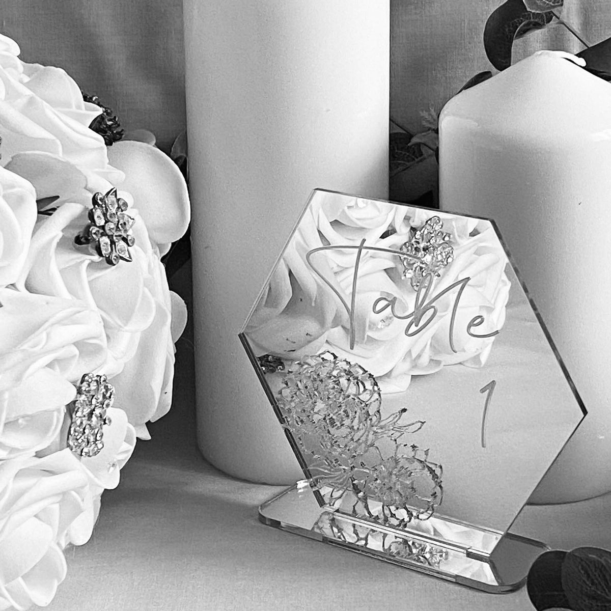 Engraved Peony Wedding Table Number shown in black and white