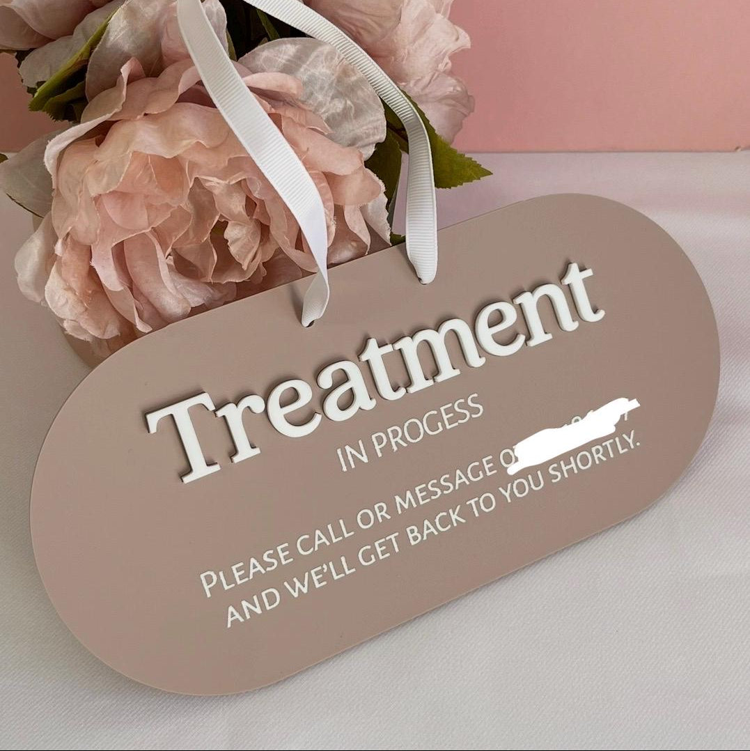 Salon Sign with the wording Treatment in progress on.