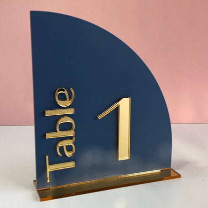Navy blue acrylic wedding table number holder with gold 'Table 1' text 