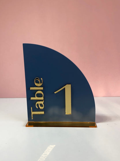 Navy blue acrylic table number holder with gold 'Table 1' text 